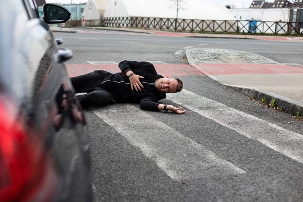 A person lying on the ground
AI-generated content may be incorrect.